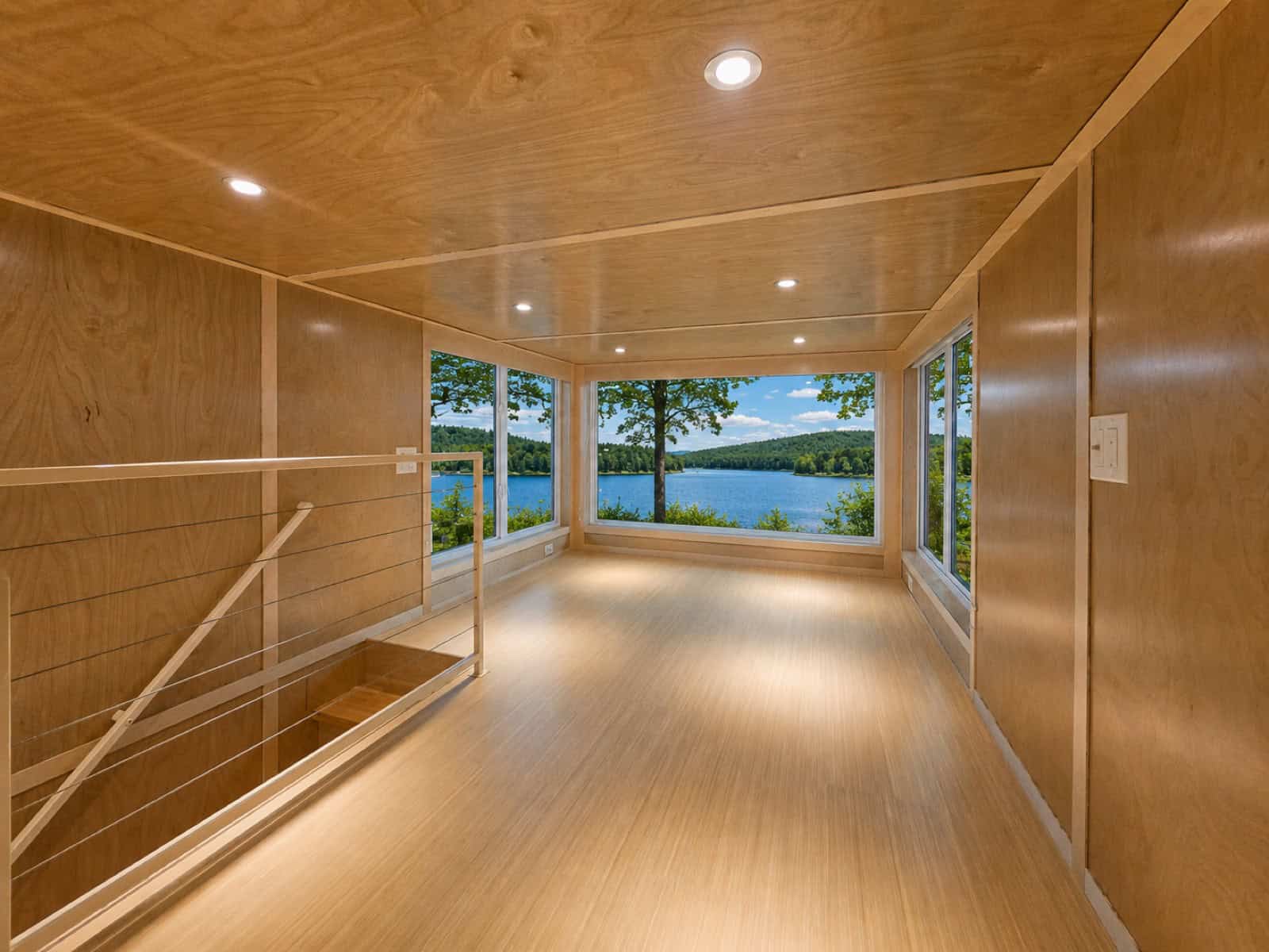 Second floor of the Escape eONE Limited Edition with windows on three sides and cable rail detailing