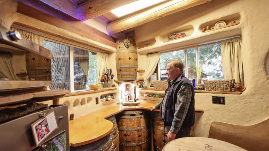 Wobbly Hobbit kitchen with wine barrel cabinets