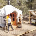 Yurt in a natural outdoor setting, showcasing sustainable living.