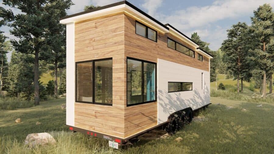 Bright and modern tiny home with large windows and natural wood accents.
