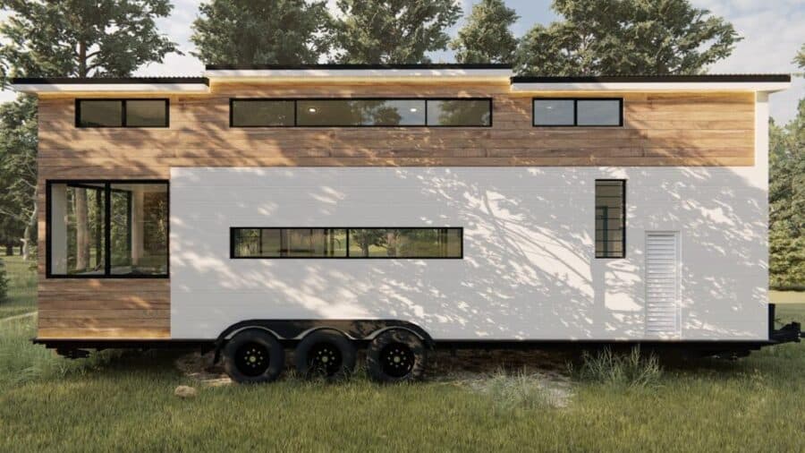 Modern family tiny house with white and wood exterior, large windows, on wheels.