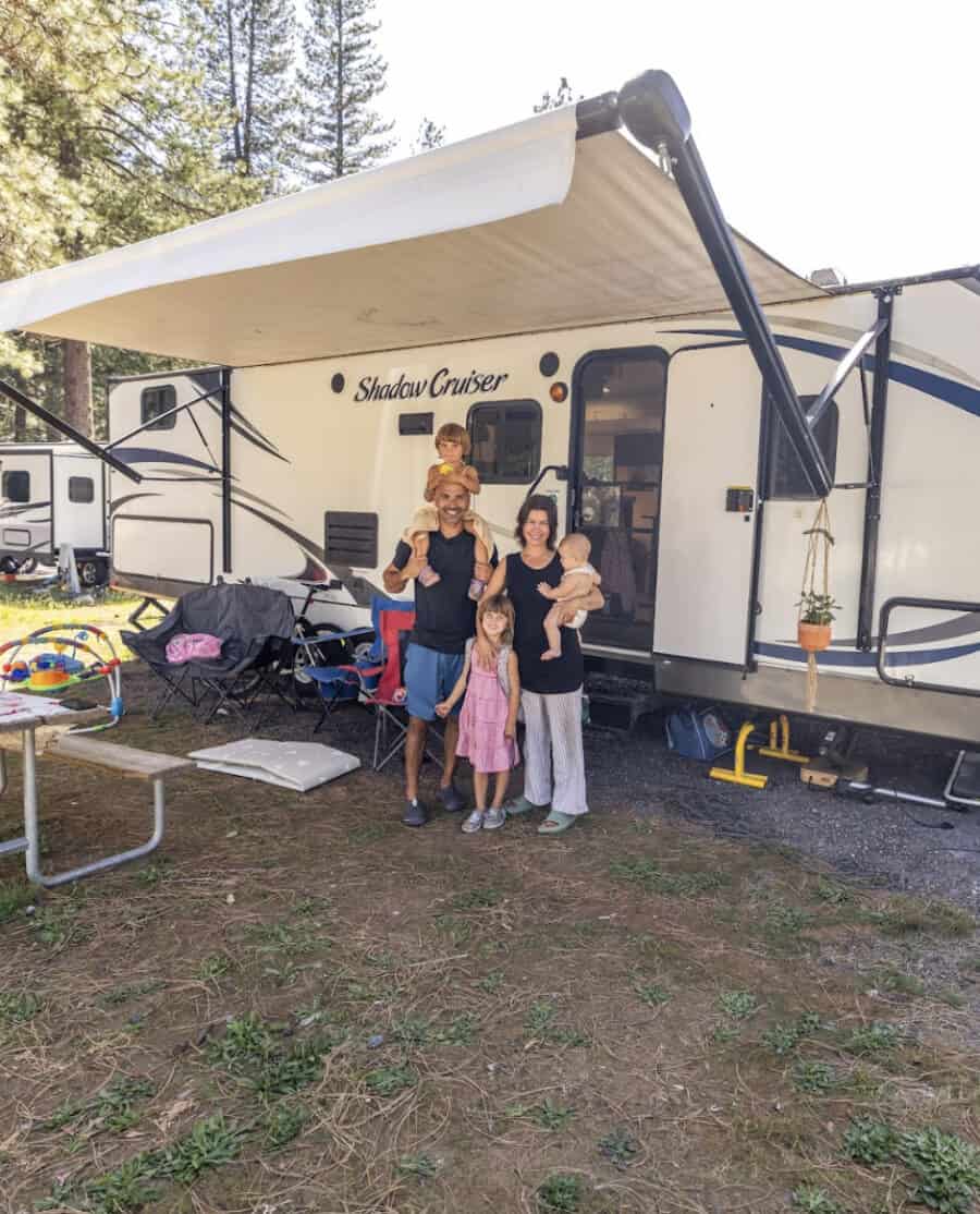 Family of 5 in a 28 ft. RV conversion, showcasing small space living and family adventures.