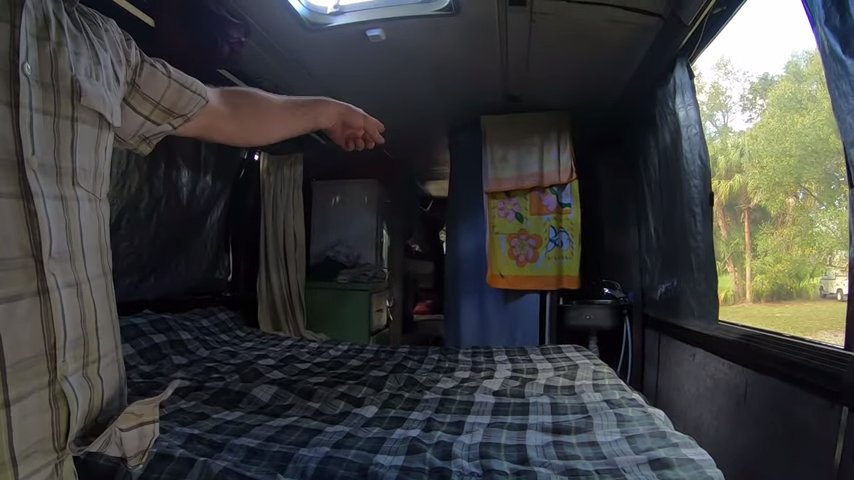 Family of 8 in huge converted bendy tour bus via Carey On Vagabond YouTube 003