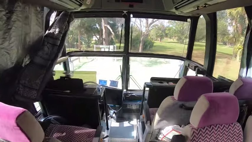 Family of 8 in huge converted bendy tour bus via Carey On Vagabond YouTube 004