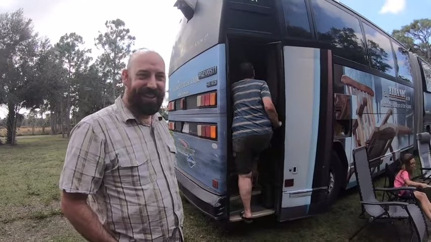 Family of 8 in huge converted bendy tour bus via Carey On Vagabond YouTube 006