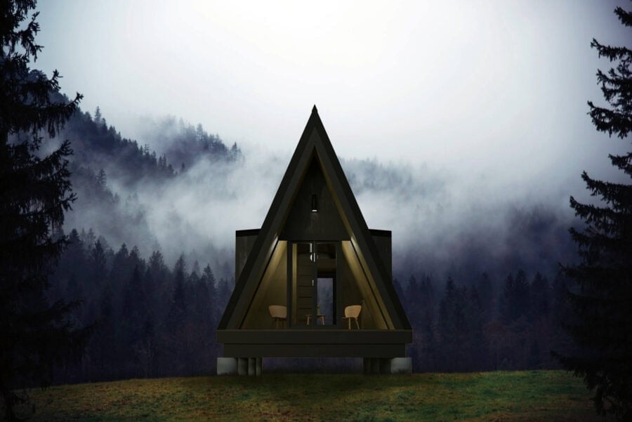 A-Frame tiny house with modern interior design nestled in a forest setting.