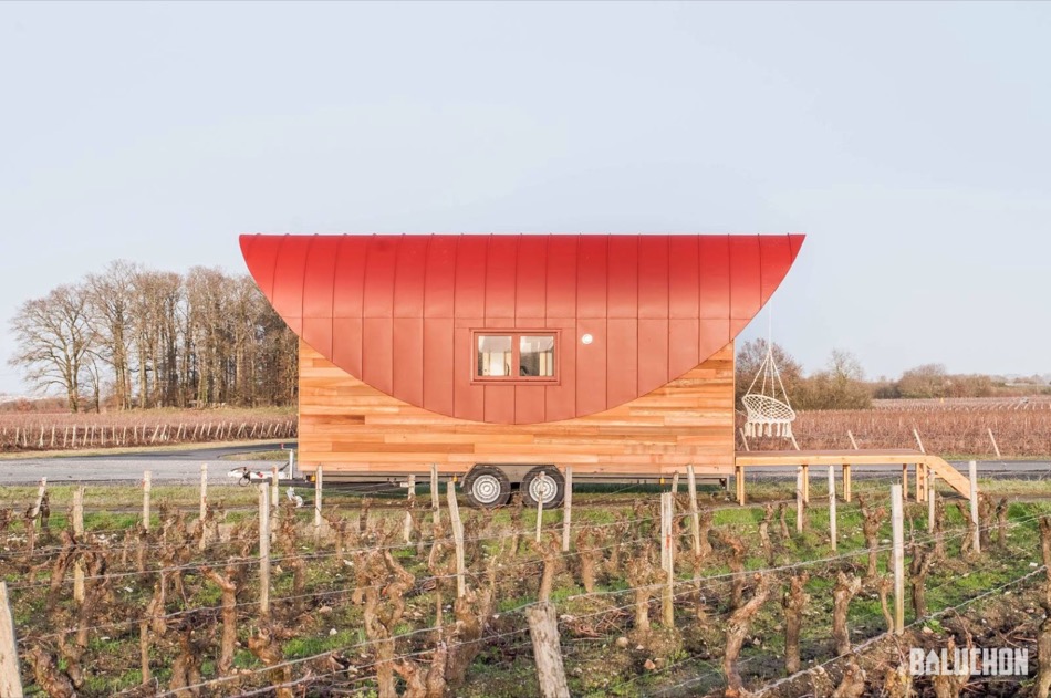 Flamenco Tiny House by Baluchon with Half Circle Frame and Curved Red Roofing 0016