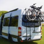 Compact van with bike rack for small space living and travel adventures.