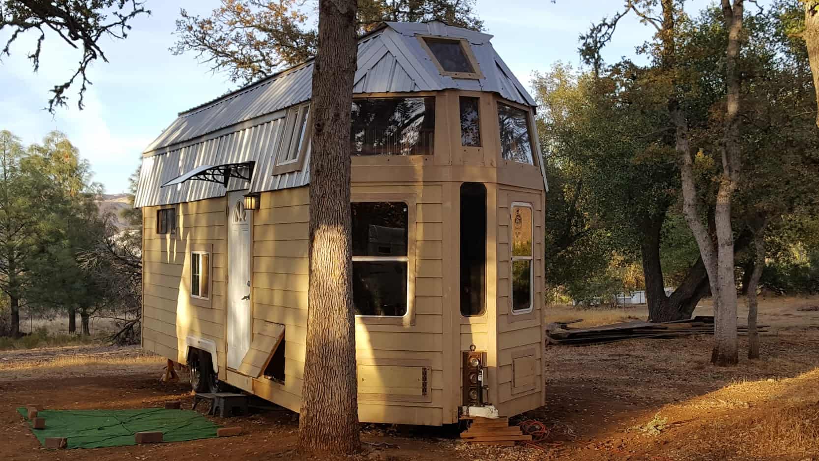 Tiny House with Unique Design and Large Windows
