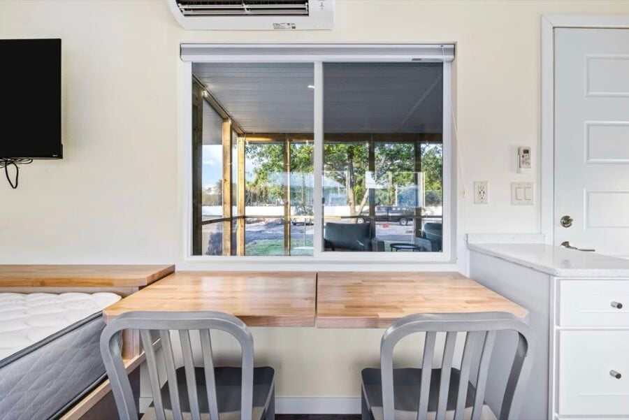 Grove Duplex kitchen workspace with washer-dryer combo and efficient layout