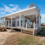 HUGE tiny house with WRAPAROUND porch via Park-Model-Homes-com 001