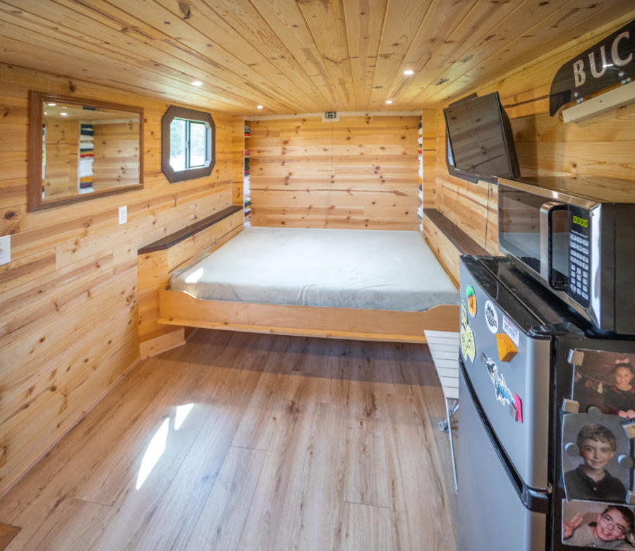 He Used an ATV Winch To Create an Epic Murphy Bed in His Cargo Trailer Camper