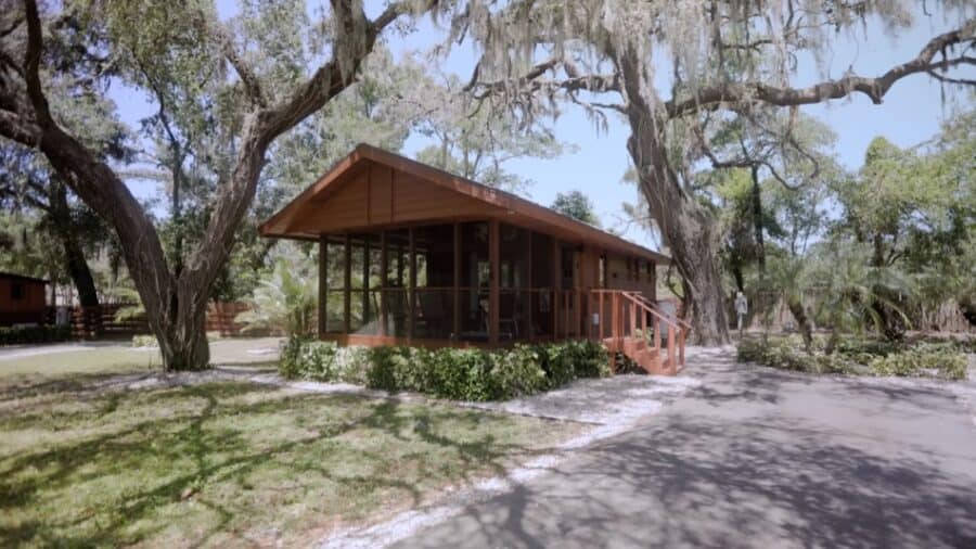 Charming 399-square-foot tiny house in Florida featuring a spacious main floor bedroom and screened.