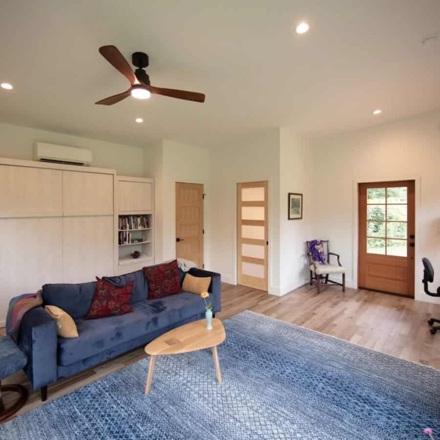 Cozy nanostead ADU cabin interior with modern furnishings in North Carolina.
