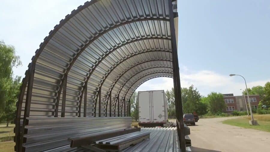 Curved corrugated steel frame of the Innovation Pod during construction