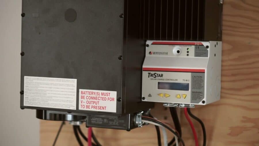 Solar charge controller and inverter mounted on the wall of the Innovation Pod