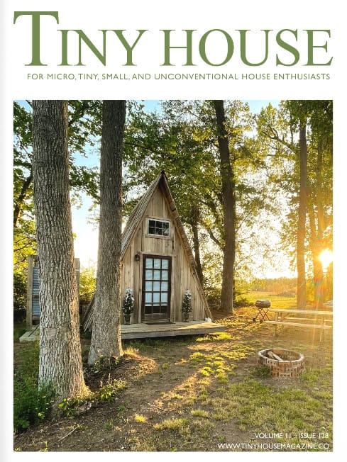 Charming tiny house nestled among trees with sunlight filtering through, showcasing innovative small.
