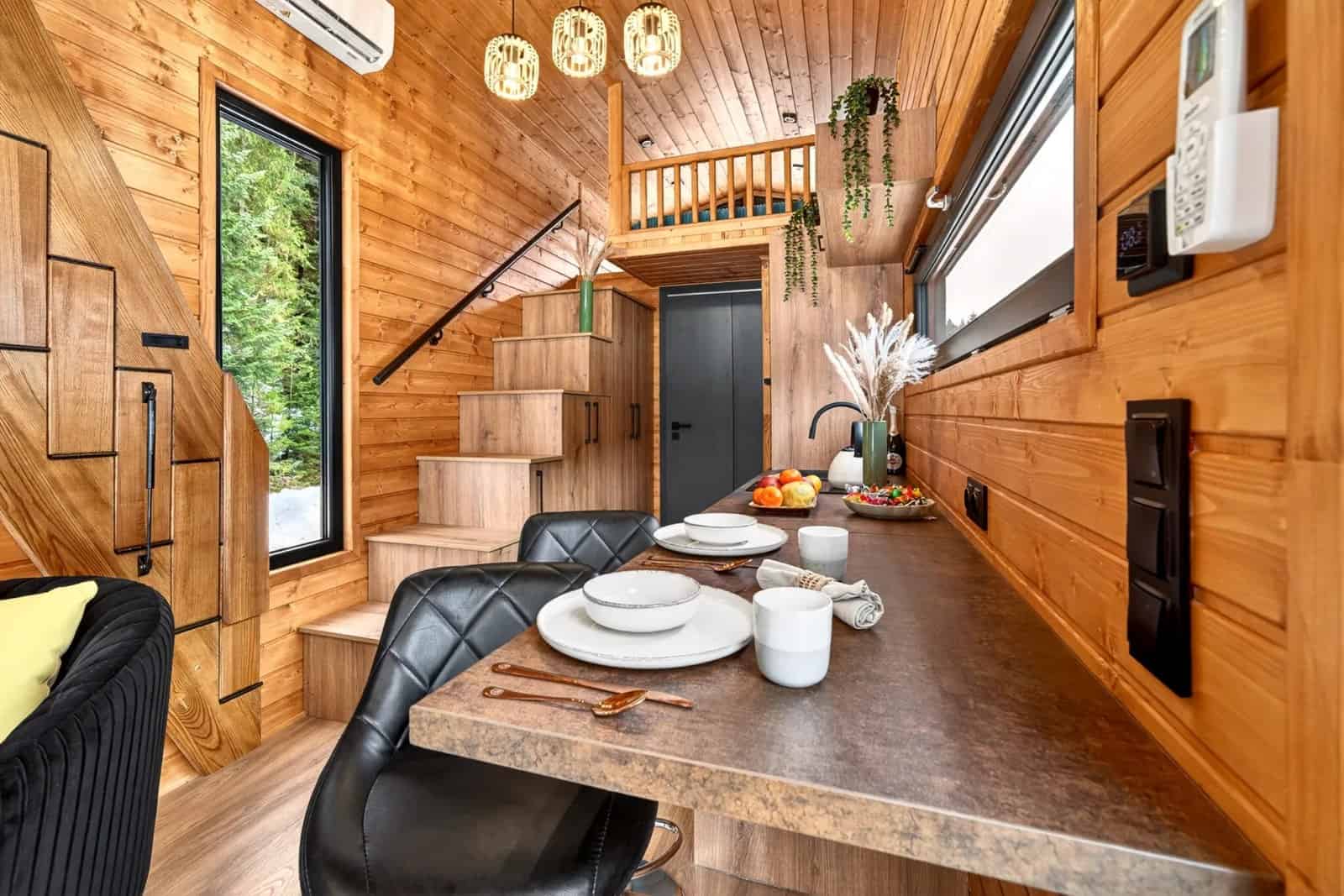 Dining counter and the staircase up to the mezzanine in the Katrin tiny house