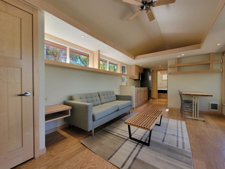 Cozy interior of a classic king XL tiny house at Wisconsin lakefront.