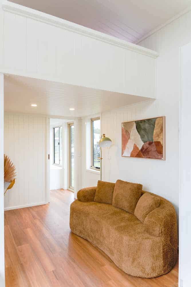 Lounge area under the loft overhang looking toward the entry door of the Kookaburra 2.0