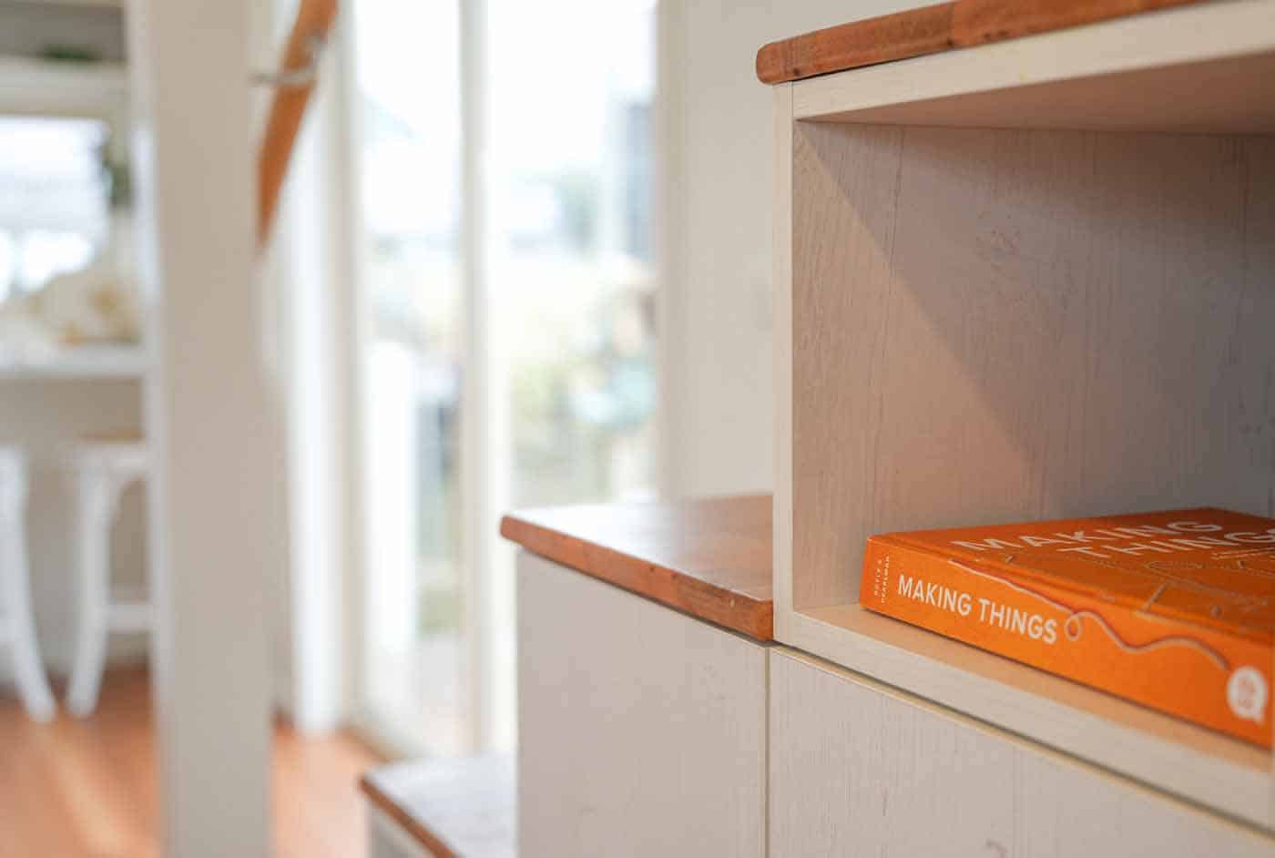 Close-up of a timber-topped open shelf built into the Kookaburra 2.0 staircase