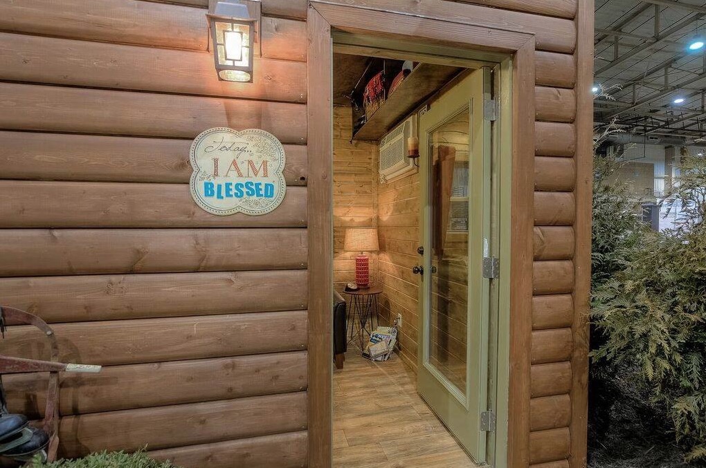 Log Cabin-style Shipping Container Tiny Home