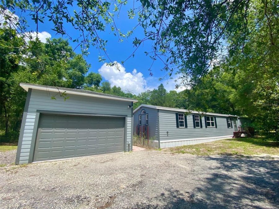 Manufactured Home with Separate Garage on 5 Acres in FL 16