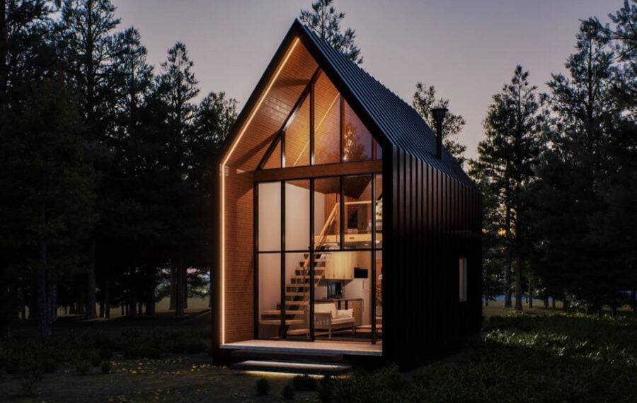 Charming modern tiny cabin featuring expansive glass walls, perfect for small space living and outdo.