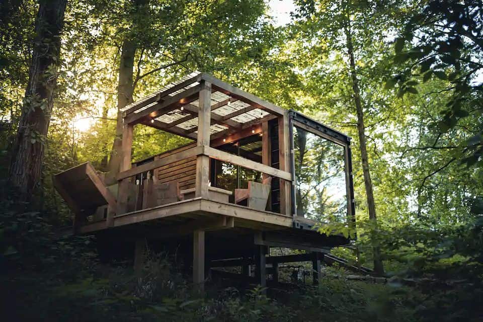 Elevated Shipping Container Cabin in Ohio Forest