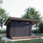 Modern tiny shed with sleek black exterior, ideal for tiny homes and small outdoor spaces.