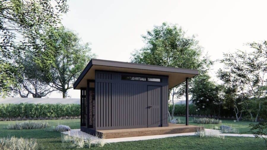 Modern tiny shed with sleek black exterior, ideal for tiny homes and small outdoor spaces.