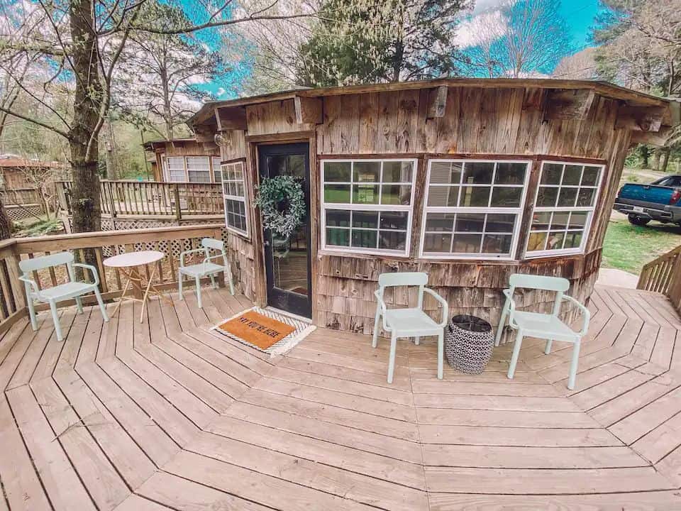 Tiny House with Central Tree Trunk Beam in Georgia