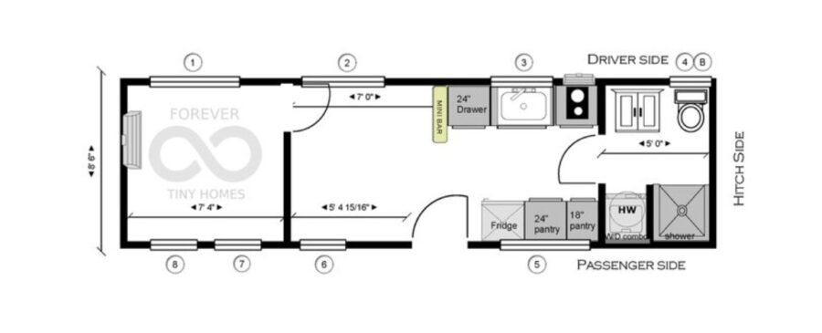 Tiny house interior with a first-floor bedroom and efficient kitchen layout.