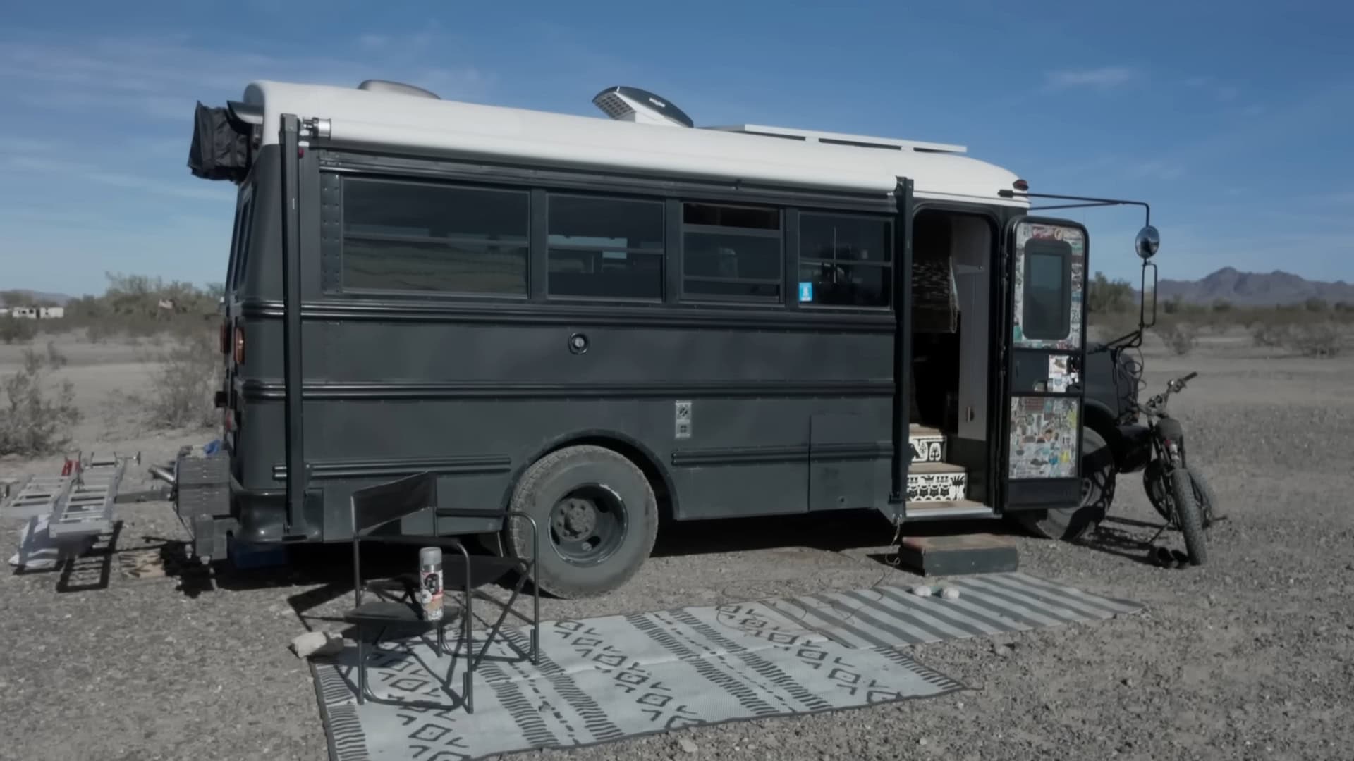 Tiny House on Wheels in Desert Landscape