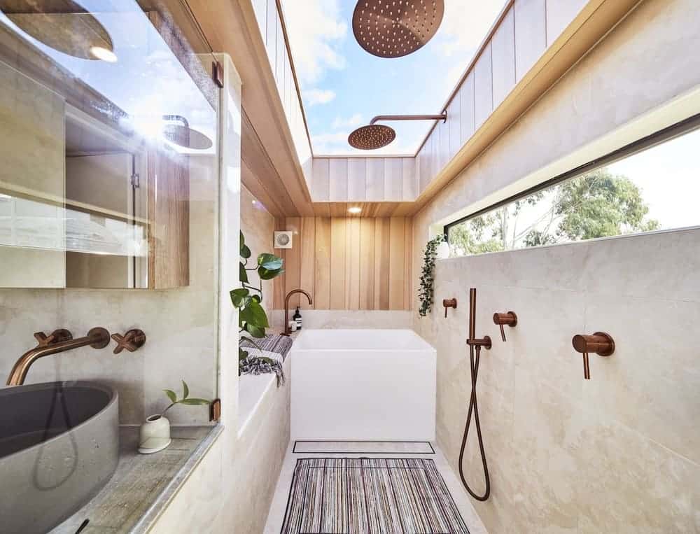 Sink and bathtub in the NOOSA tiny house bathroom