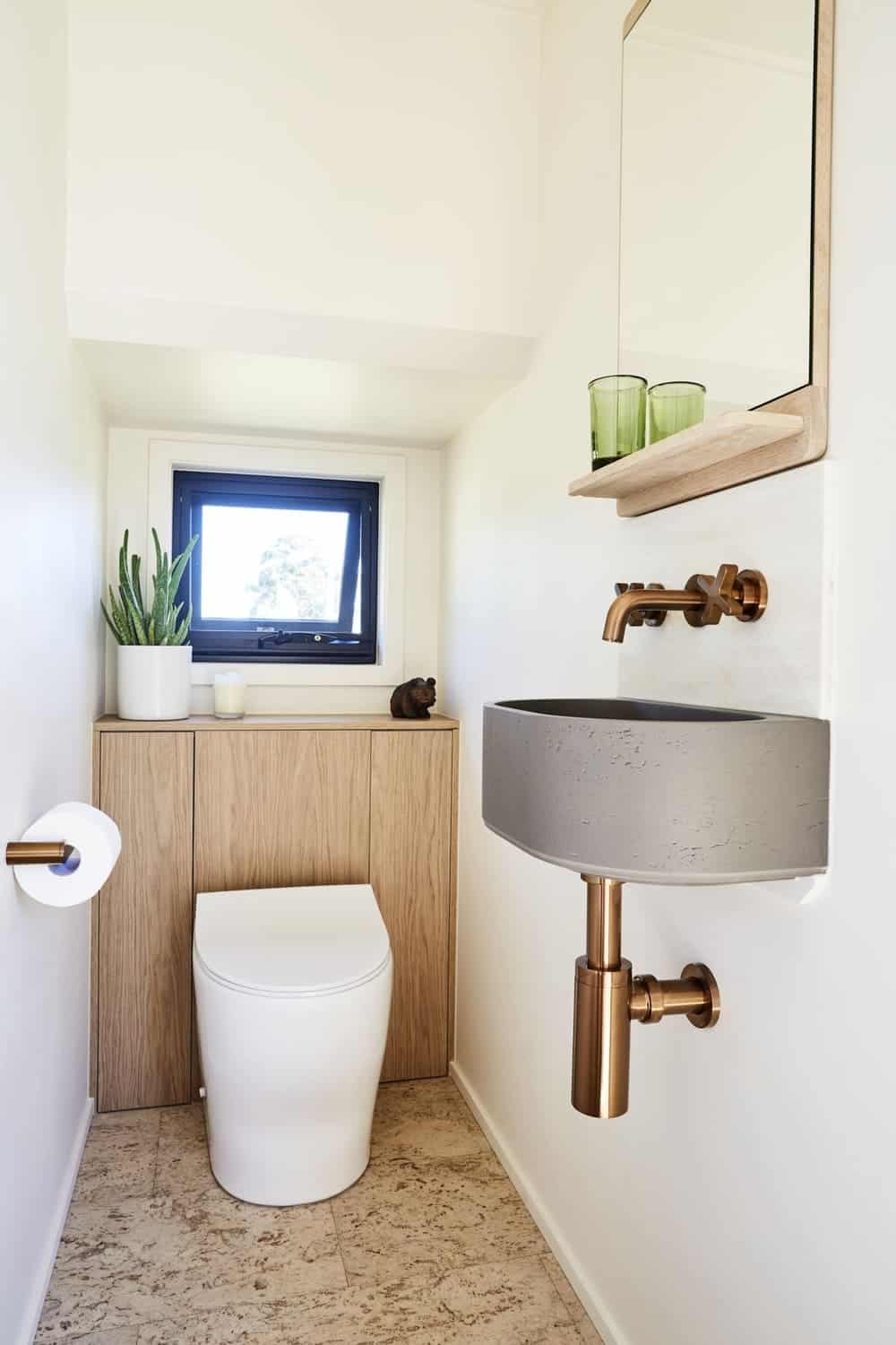 Separate enclosed toilet room in the NOOSA tiny house