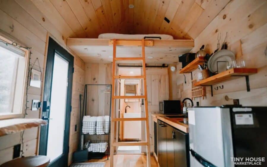 Interior view of a secluded Nordic-style tiny home with a loft on 5 acres in Knoxville, TN.