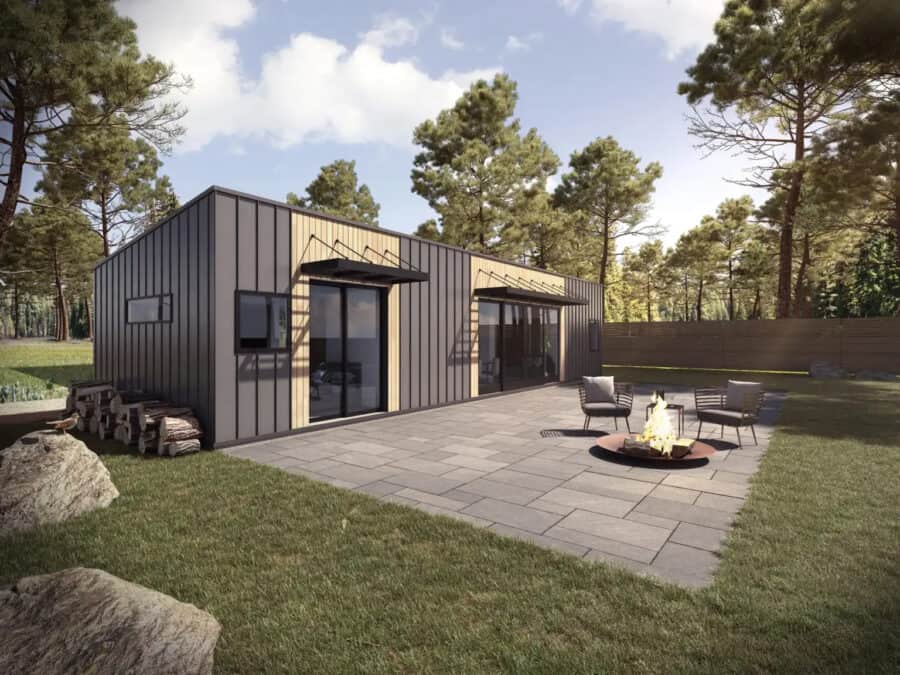 Modern prefab pod home with sleek black exterior and large glass doors, perfect for compact living a.