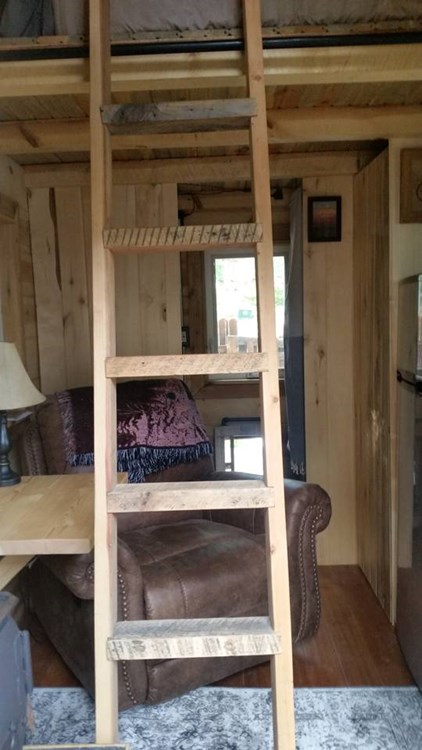 Off-Grid Tiny House with Dutch Doors Ladder and Living Room