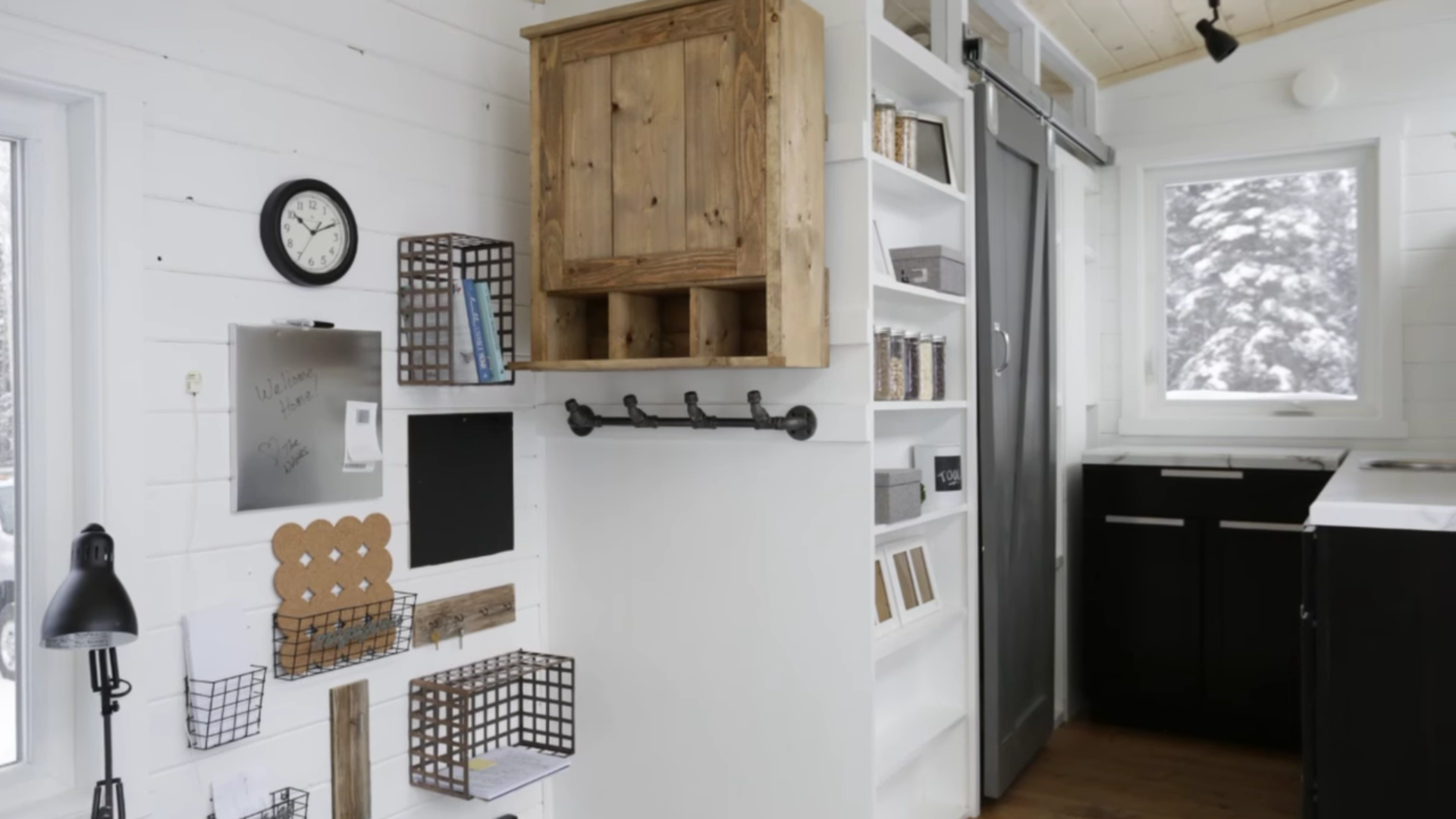 Open Concept Tiny House with DIY Elevator Bed That Hides Into the Ceiling