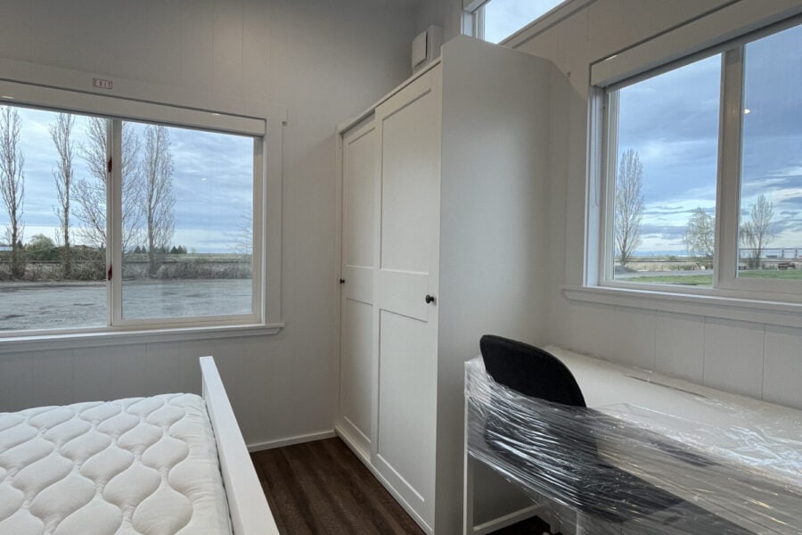 Bright interior of a 44-foot Orca tiny house by Mint Tiny House Company.