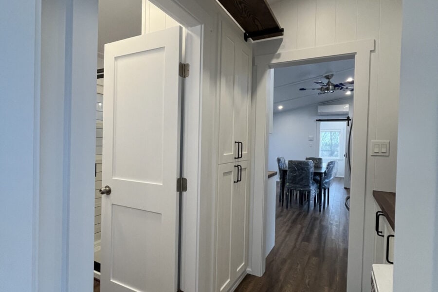 Bright interior of the 44-foot Orca Edition tiny house by Mint Tiny House Company.