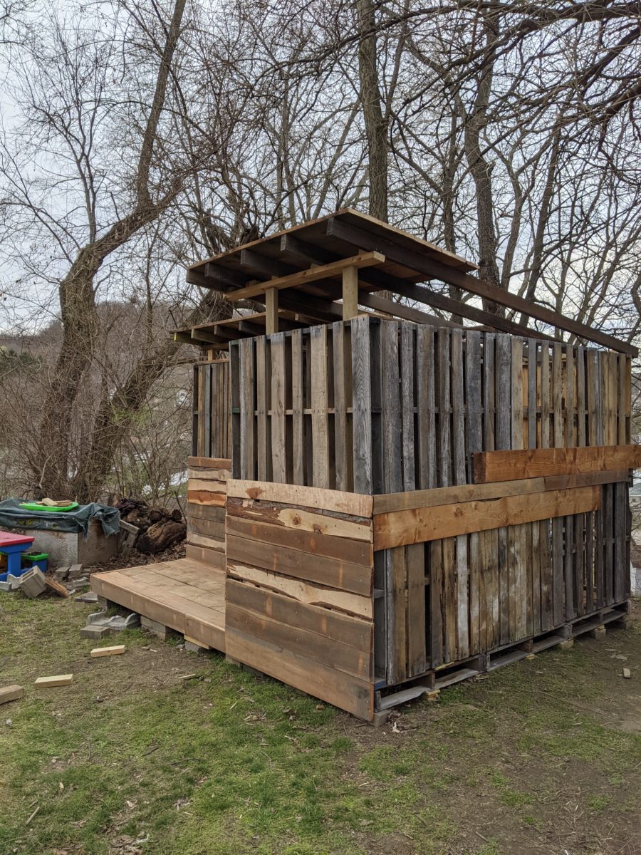 Dad Builds Son Nearly-Free Pallet Cabin 7