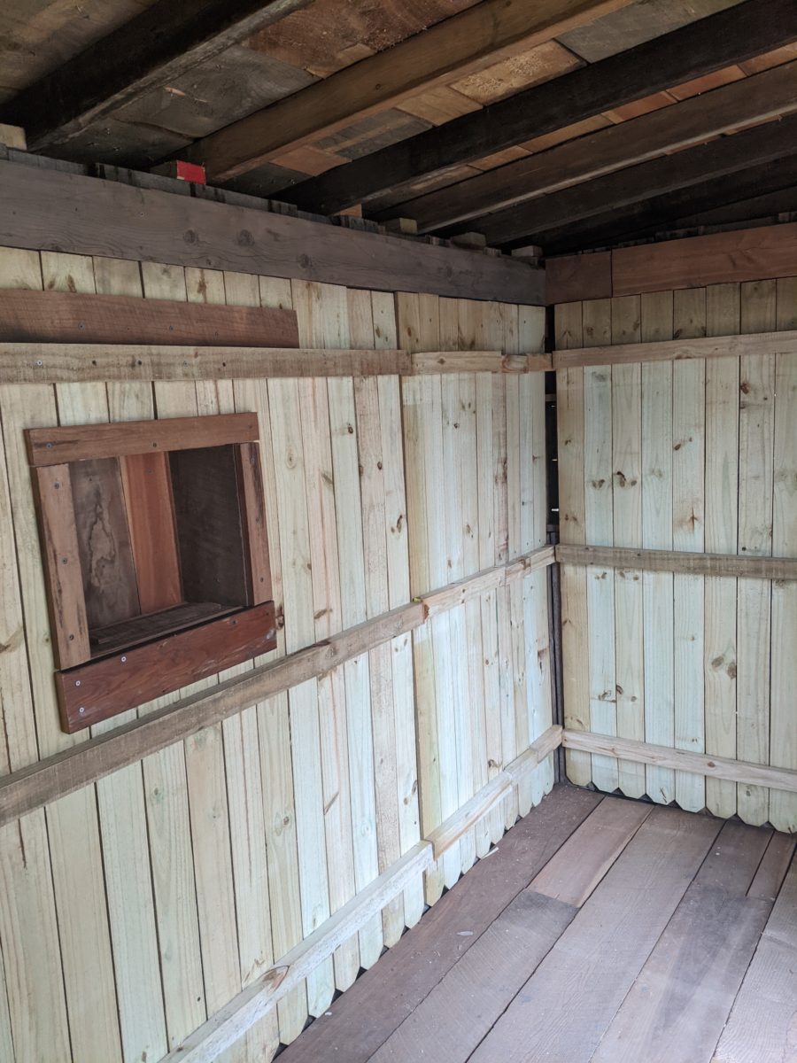 Dad Builds Son Nearly-Free Pallet Cabin 5
