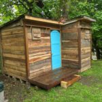 Dad Builds Son Nearly-Free Pallet Cabin 9