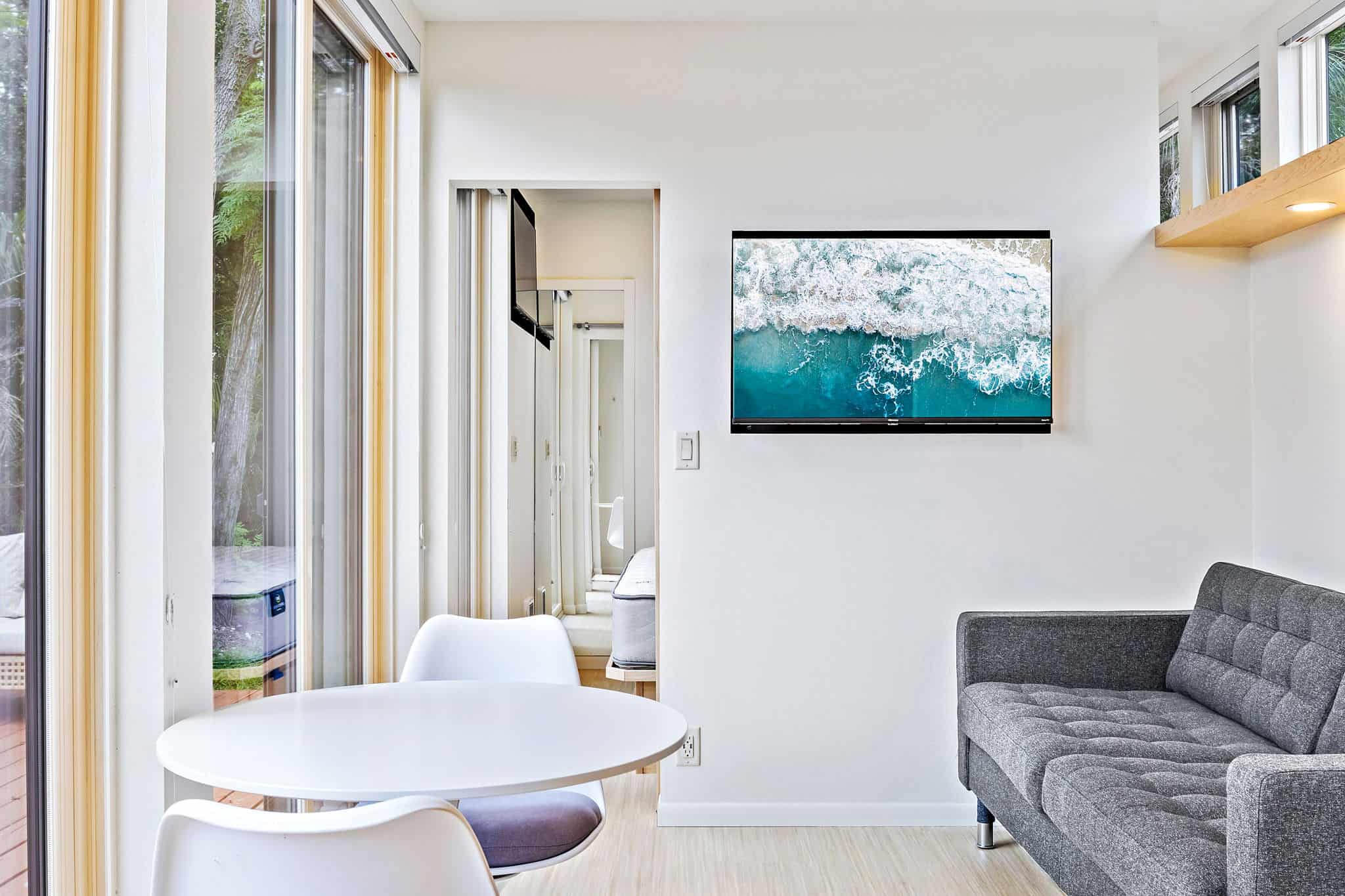 Open living room with Smart TV inside the Escape N2 tiny house