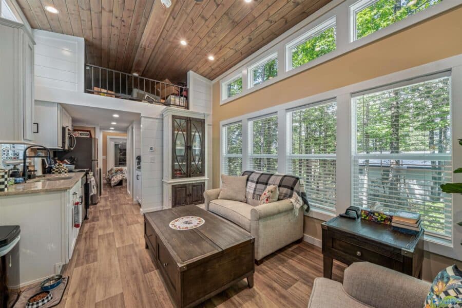 Living room with comfortable seating and wood interior finishes