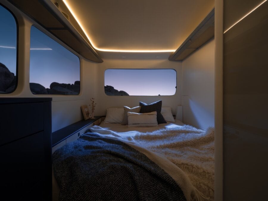 Pebble Flow electric trailer interior with Murphy bed and office desk
