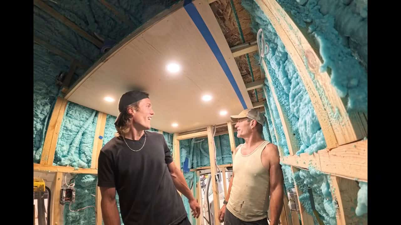 Closed-cell spray foam insulation applied throughout the van shell