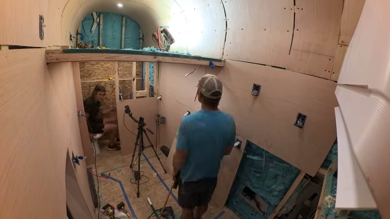 Plywood interior showing the stacked two-level layout